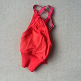 orangey red bralette in S