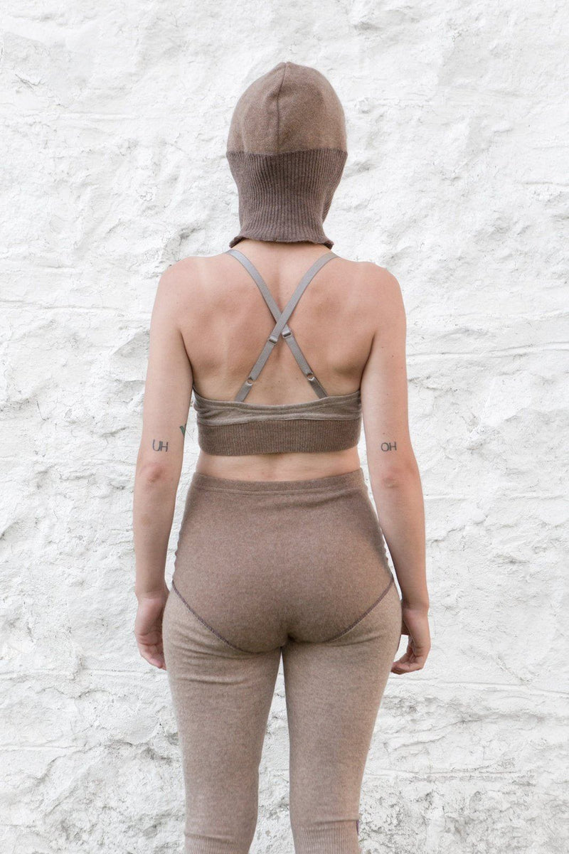 model wearing dark sand cashmere balaclava, bralette and longjohns